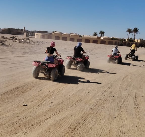 TH Exclusives: 5 hrs Quad Bike with BBQ Dinner from Hurghada