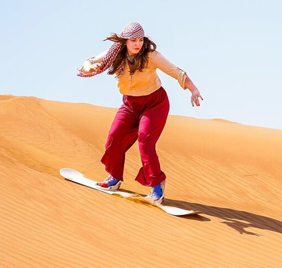 Dubai: Sandboarding, Camel Ride and Red Dune Bashing Safari